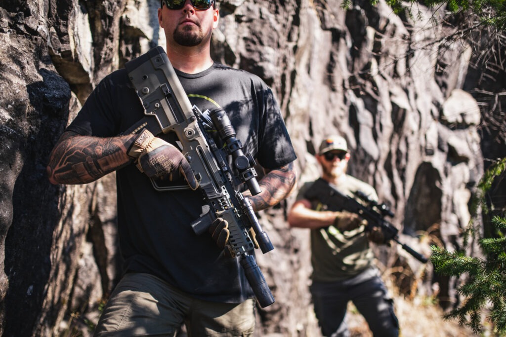 creative shoot with two guys holding tavor x95 rifles