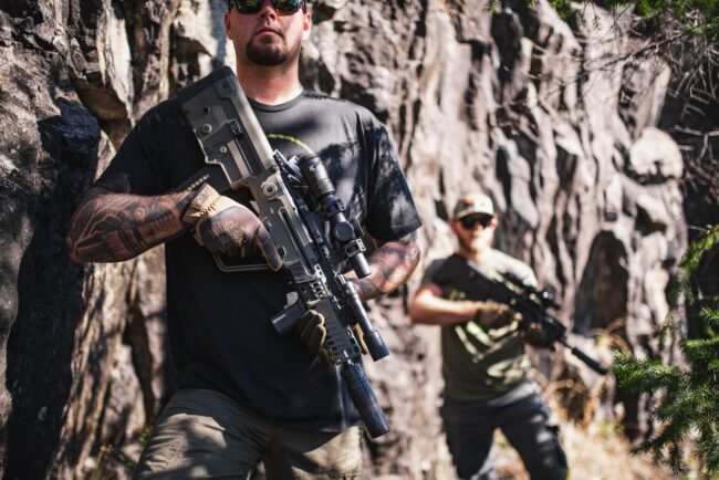 creative shoot with two guys holding tavor x95 rifles